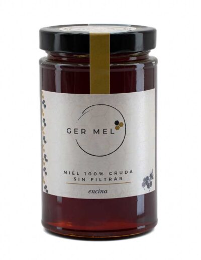 Tarro de cristal de 1kg de miel de encina Ger Mel, de color ámbar oscuro.